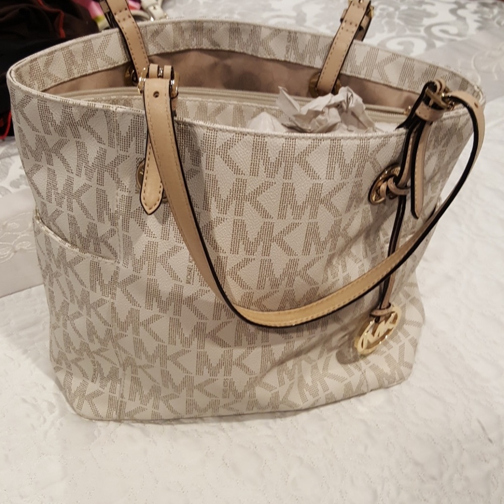 Michael Kors canvas shoulder bag.